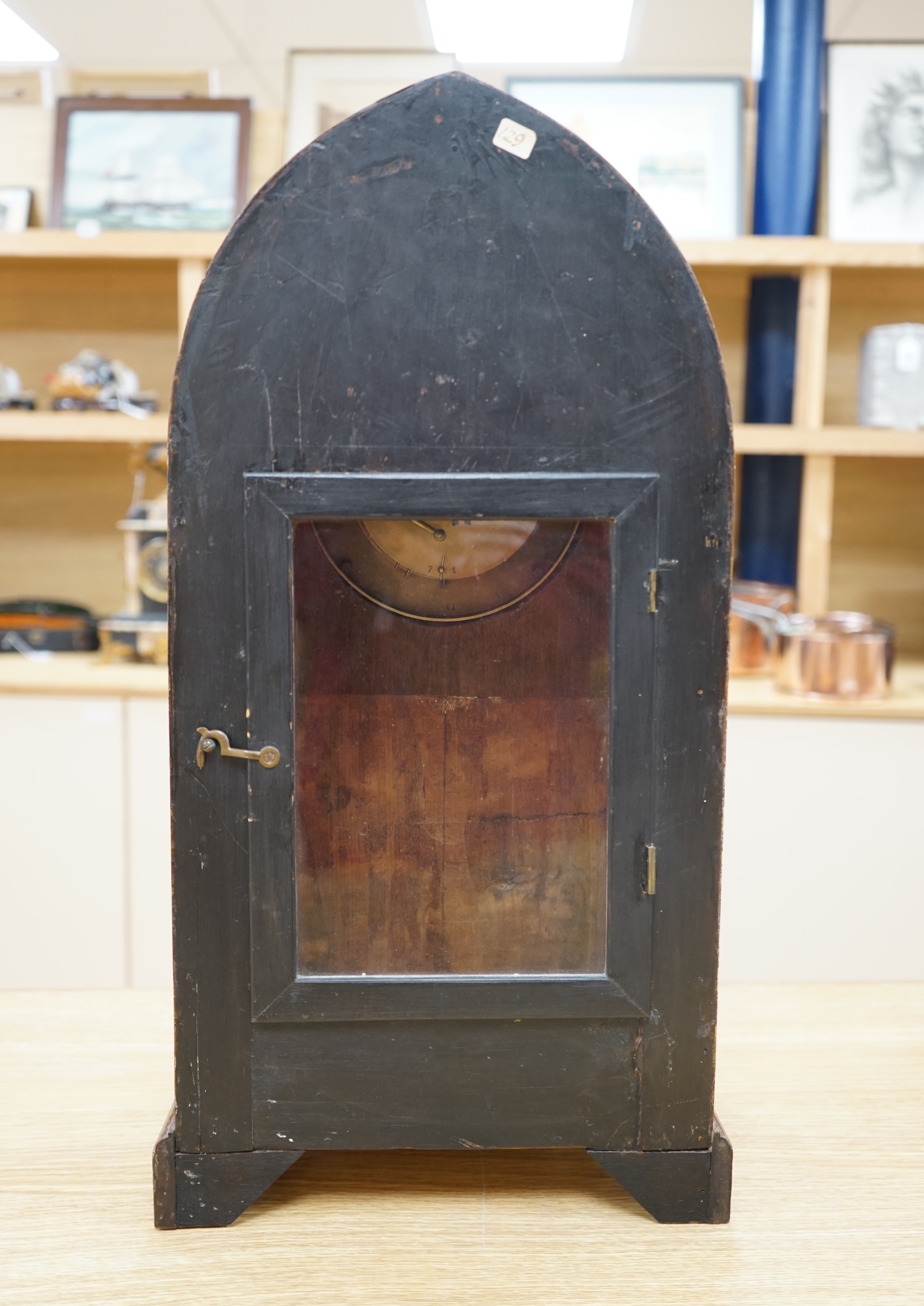 A late 19th century shell inlaid mahogany eight day lancet topped bracket clock, 56cm high. Condition - case good, clock lacking pendulum, untested if working.